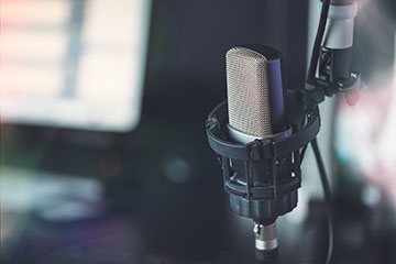 Closeup of microphone used for recording a podcast