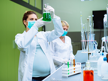 Pregnant woman in lab