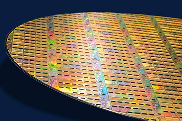 Close-up image of a silicon photonics wafer