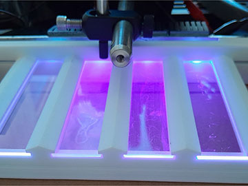 UV-Emitting Glass Prevents Biofilm Growth