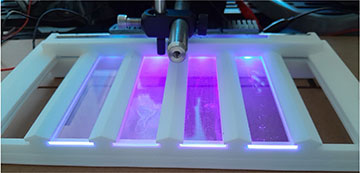 Glass glowing from UV waves