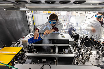 Researcher in lab with spectrometer
