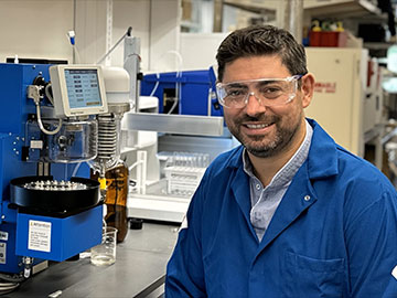 man seated in lab