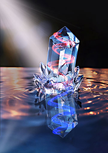 A crystal and its reflection, one with blue swirling through it and the other with red swirling