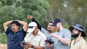 4 men, including Kenneth Richard Geipel, manning a drone controller