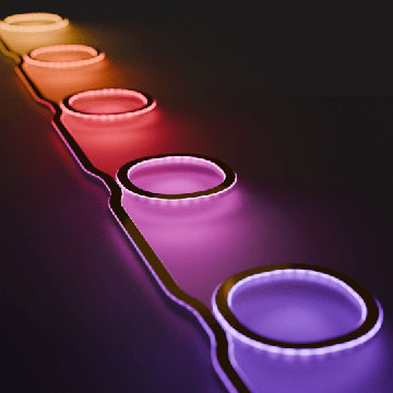 A render of five rings, each glowing a different color