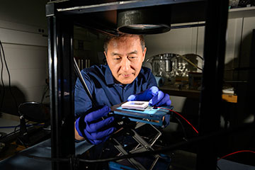 Chunlei Guo testing solar thermoelectric generator in lab