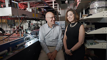 Alexander Gaeta and Michal Lipson in a lab