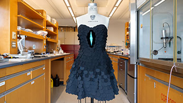 Black dress on a dress form in a lab