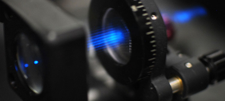 Low-Cost Lenses Deliver Super-Resolution Images