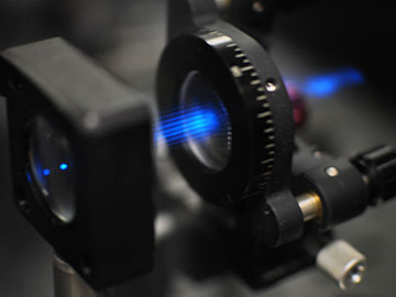 Low-Cost Lenses Deliver Super-Resolution Images