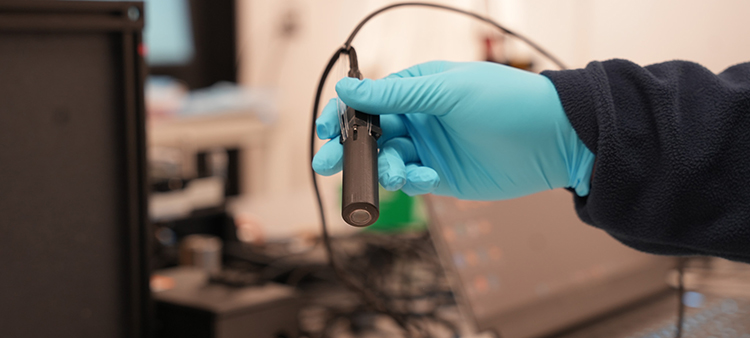 A Handheld, AI-Powered Microscope for Cancer Screening