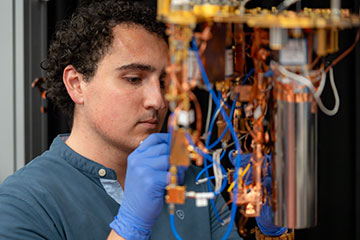 Researcher working with device