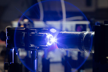 device with blue light beam