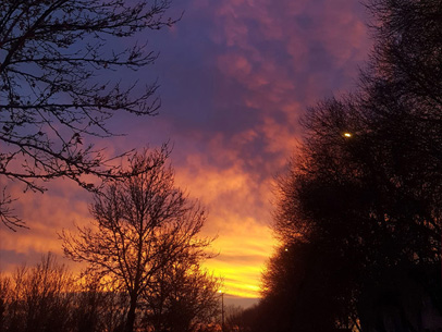 At twilight, sunlight grazing the horizon is sculpted by Rayleigh and Mie scattering